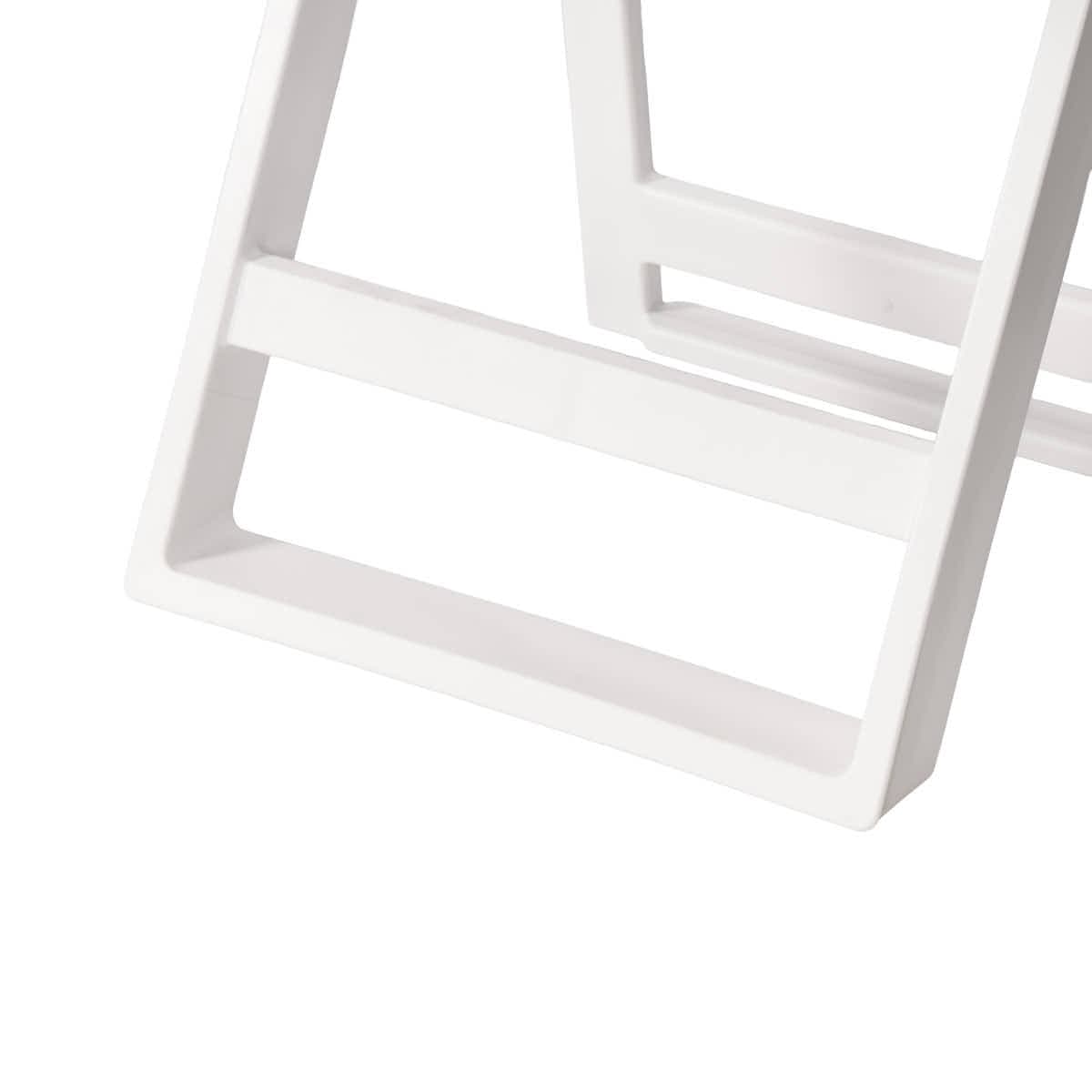 Our proprietary ground rail — the reason the chair stays level on turf and sand.