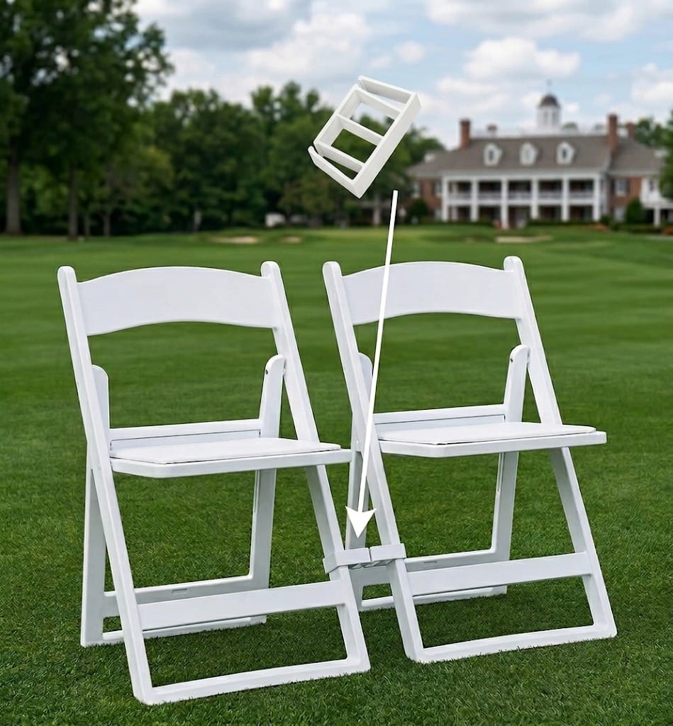 Two white folding chairs ganged together on a lawn, with an arrow to the ganging clip