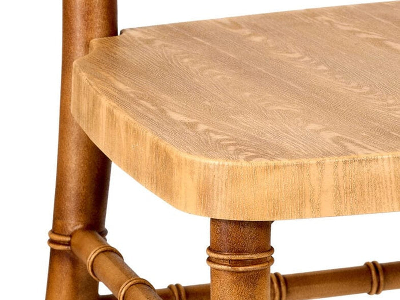 The WoodGrain™ texture option is molded into the resin, not printed on it. From two rows back, guests do not know it isn't wood.