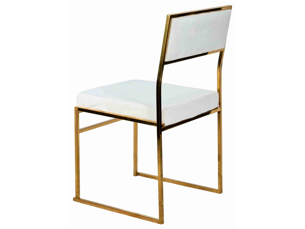 Another angle on the same chair. The frame finish is constant across the collection; the cushion color is the only variable.