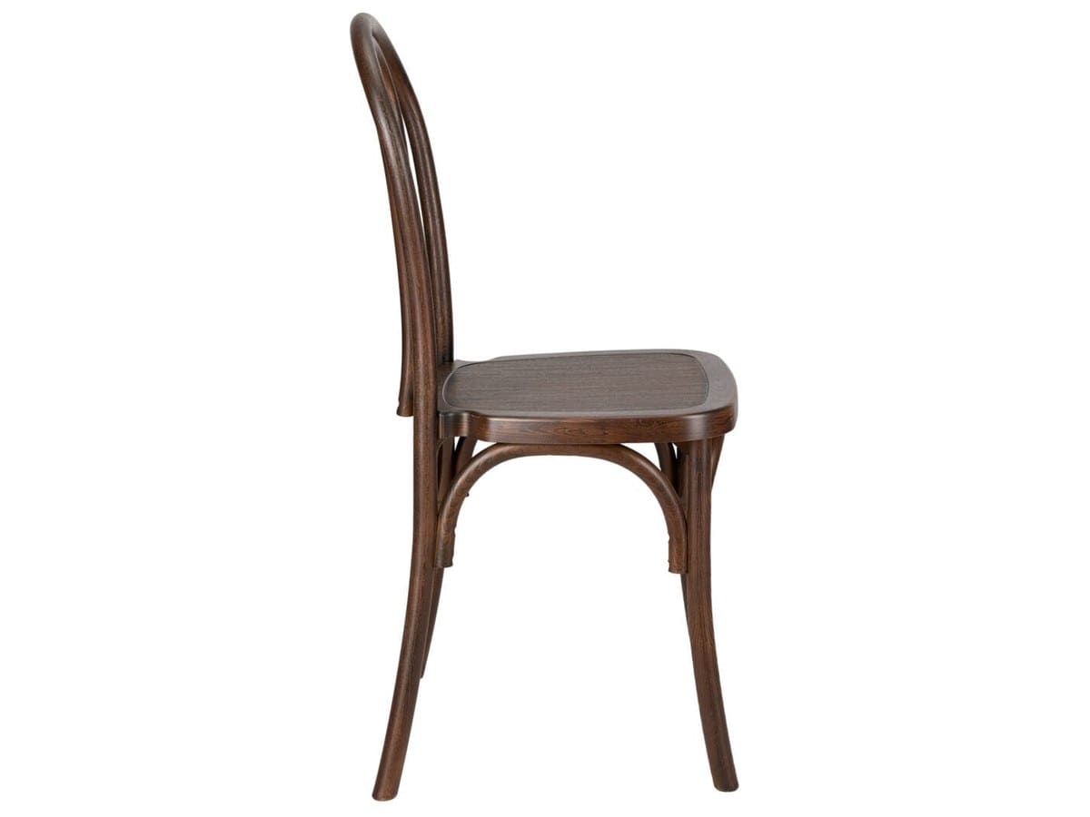 The same chair from a second angle. The collection also includes a clear version and two SKUs with genuine woven rattan inserts.